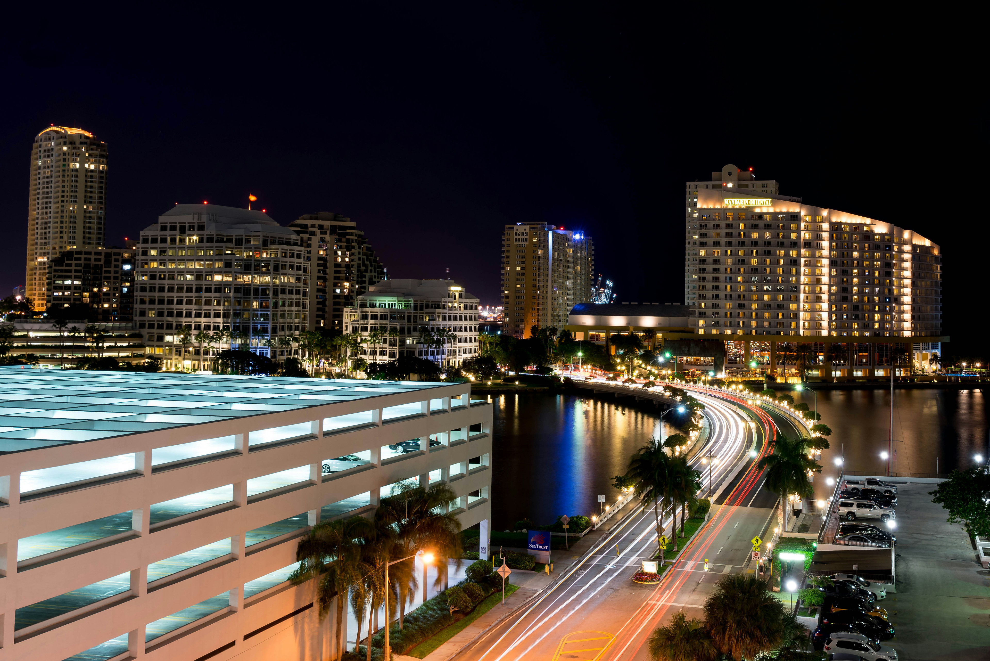 Brickell Key towers at night, with the light trails of Brickell Key Drive